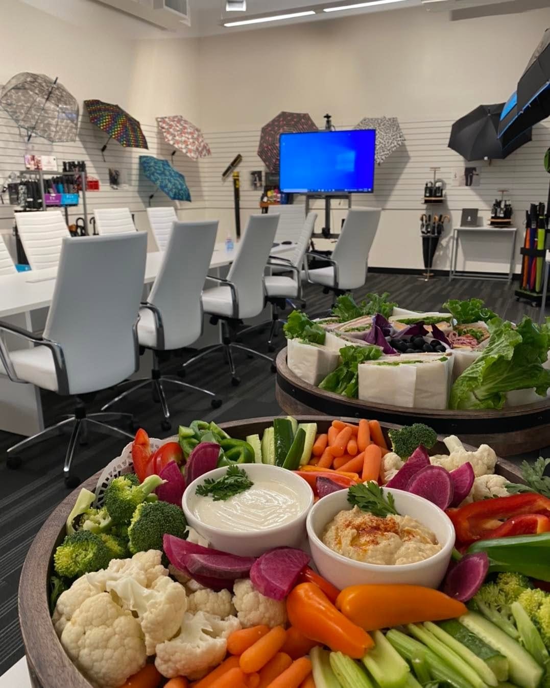 Catering spread with food trays for an event